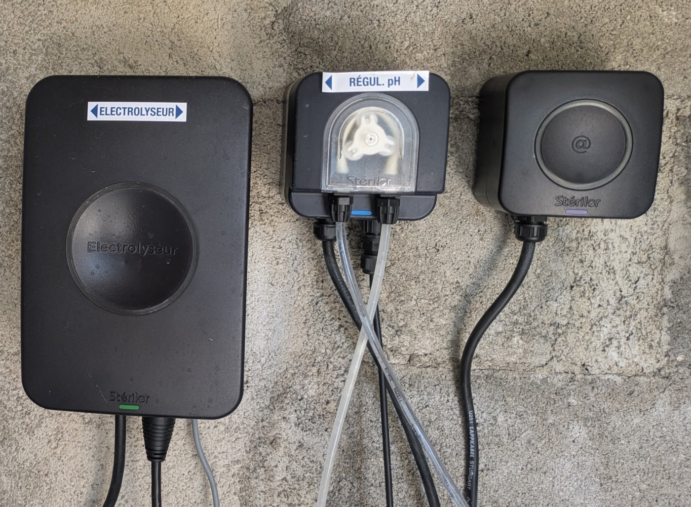 Sterilor XP salt chlorinator, pH regulator, and Connect module installed in a pool technical room