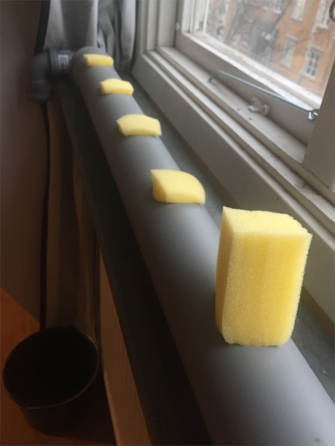 Putting the sponges in the pipe