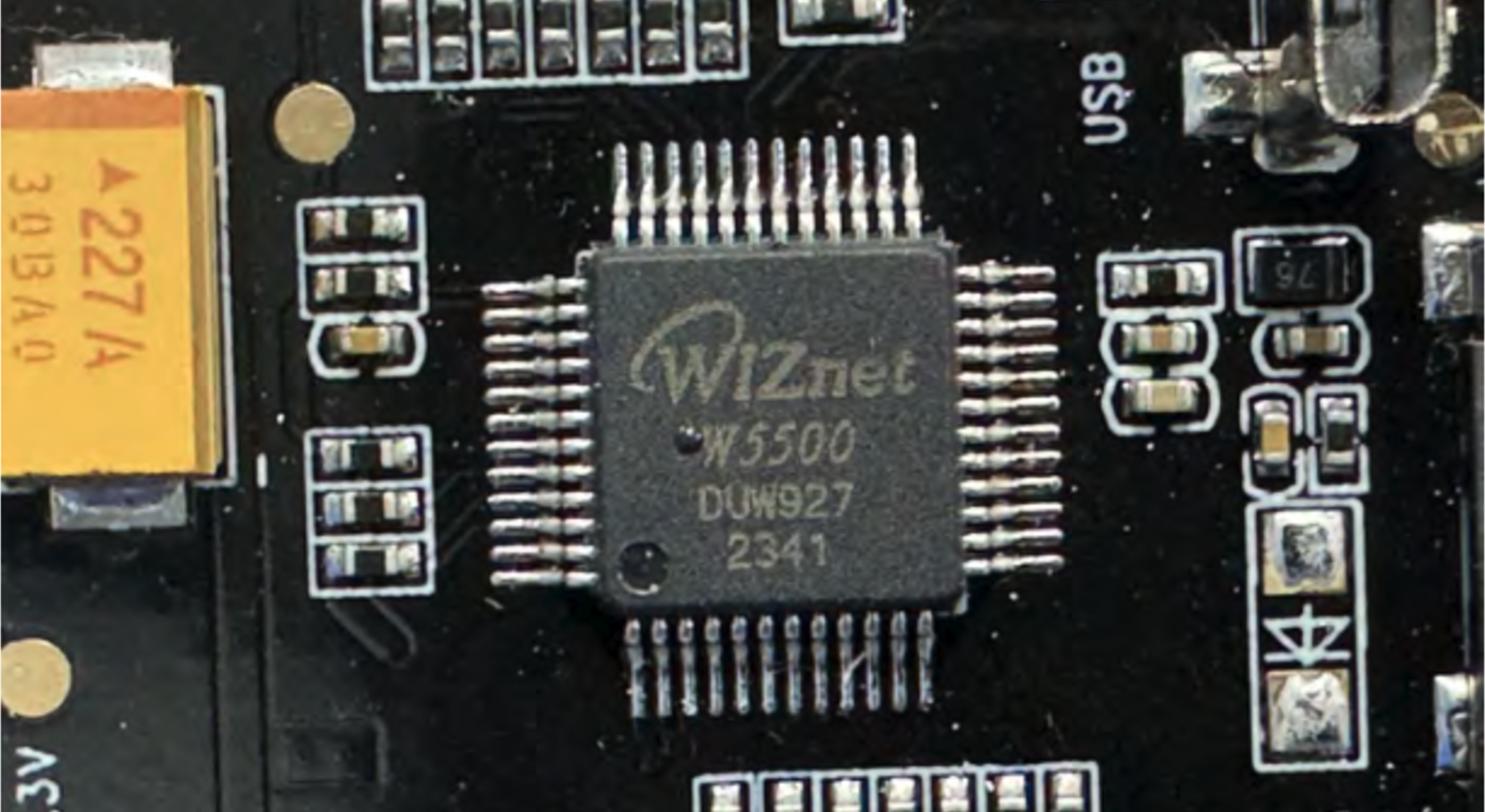 FCC internal photo close-up of the WIZnet W5500 chip on the Rently Access Panel main board
