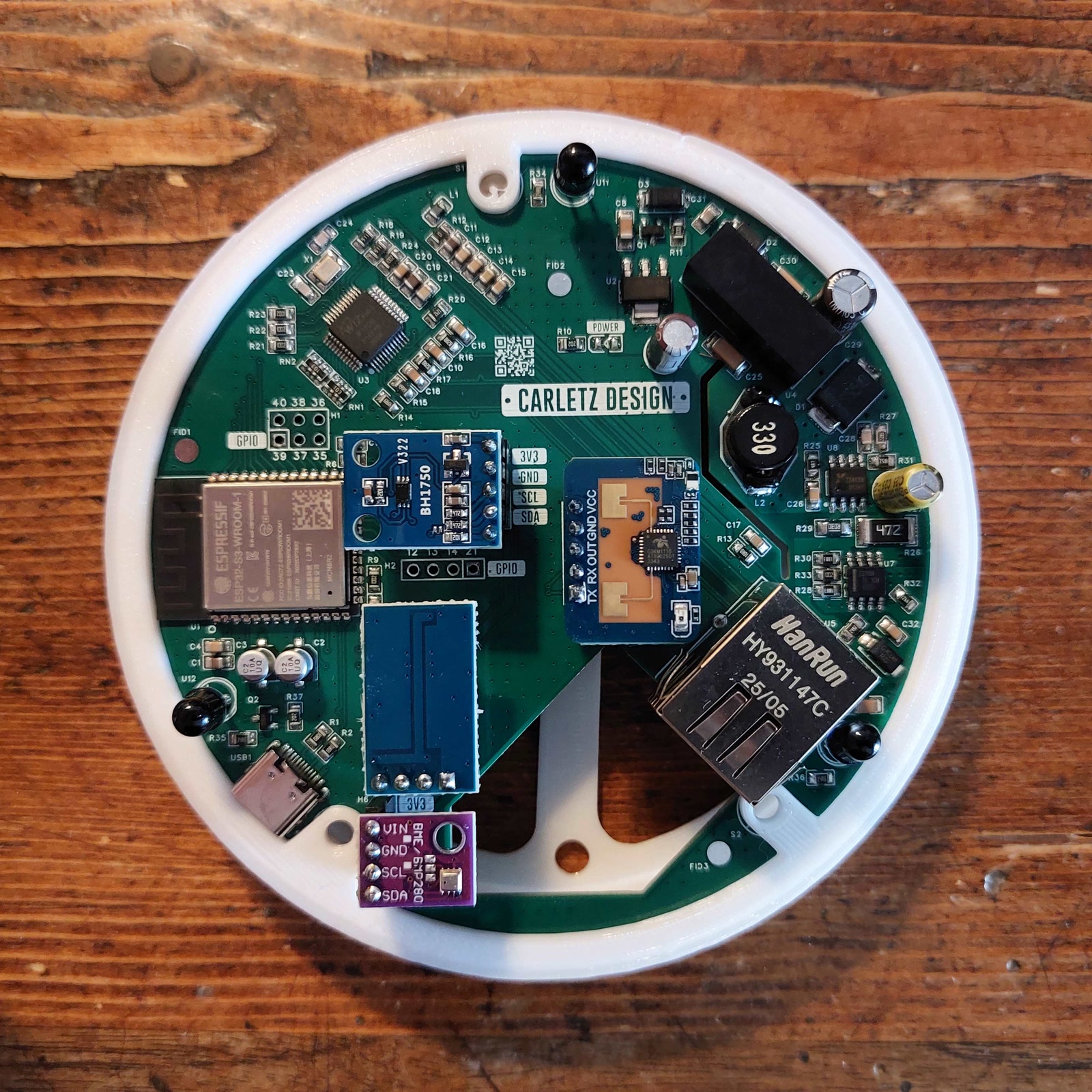 Actual assembled Carletz MultiSensor V1 board in an open enclosure base