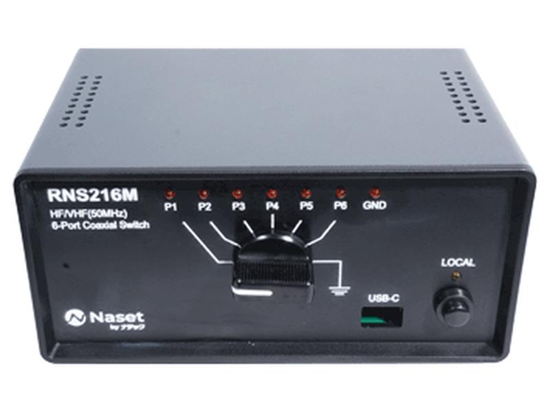 Front view of the black steel Naset RNS216M case, silkscreened RNS216M, HF/VHF 50MHz, 6-Port Coaxial Switch, with a row of seven indicator LEDs labelled P1 to P6 and GND above a rotary switch, a USB-C socket, a LOCAL push button and the Naset by NATEC logo