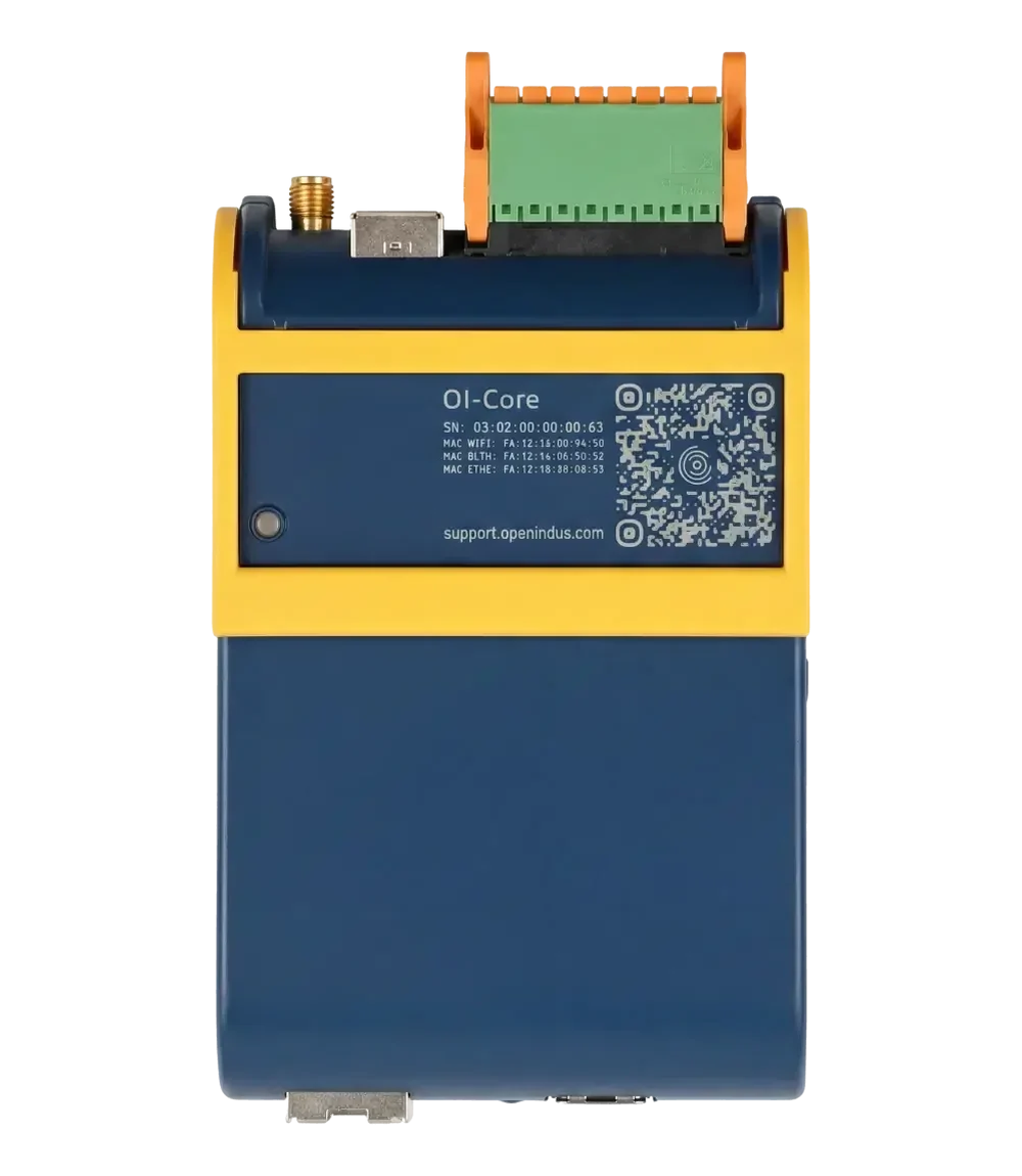 Rear face of the OpenIndus OI-Core module in its blue and yellow enclosure, showing the product label with a serial number, a QR code, and three printed MAC addresses labeled MAC WIFI, MAC BLTH and MAC ETHE, below an SMA antenna connector, a USB port and a green terminal block