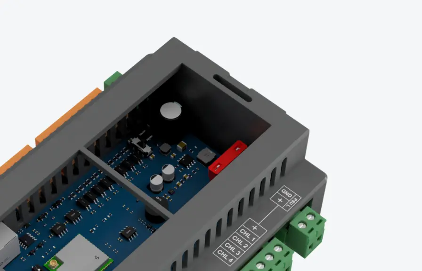 Cutaway 3D render showing the interior of the dimmer enclosure with a blue printed circuit board, electrolytic capacitors, a red jumper and green output terminals visible through the open top of the case